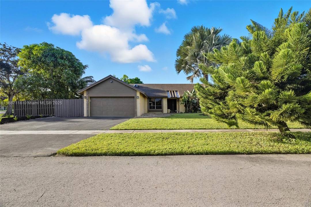 Very Motivated Sellers ! Discover this beautifully maintained single family home on a spacious fenced corner lot in Lauderhill.