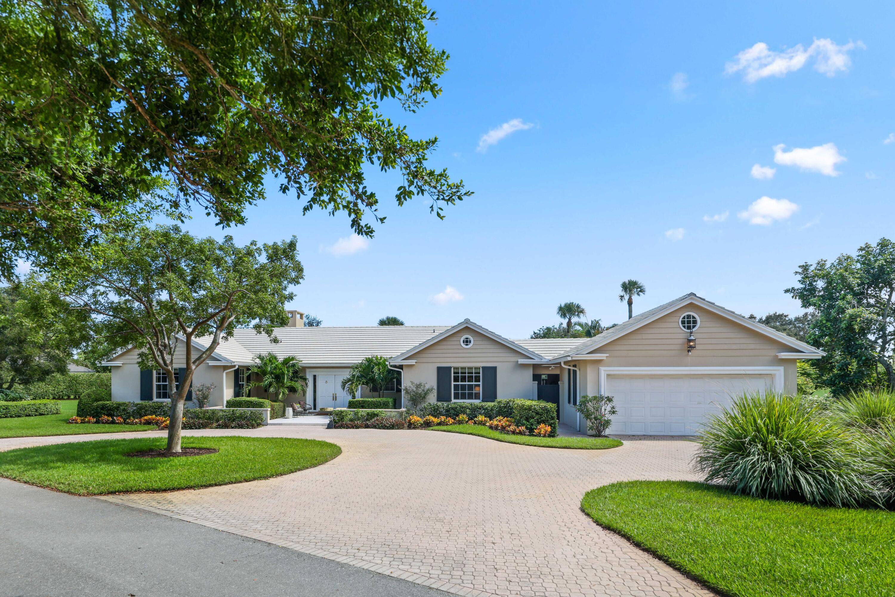 Set on a generous. 88 acre lot overlooking the 8th tee, this stately 3 bedroom, 3.