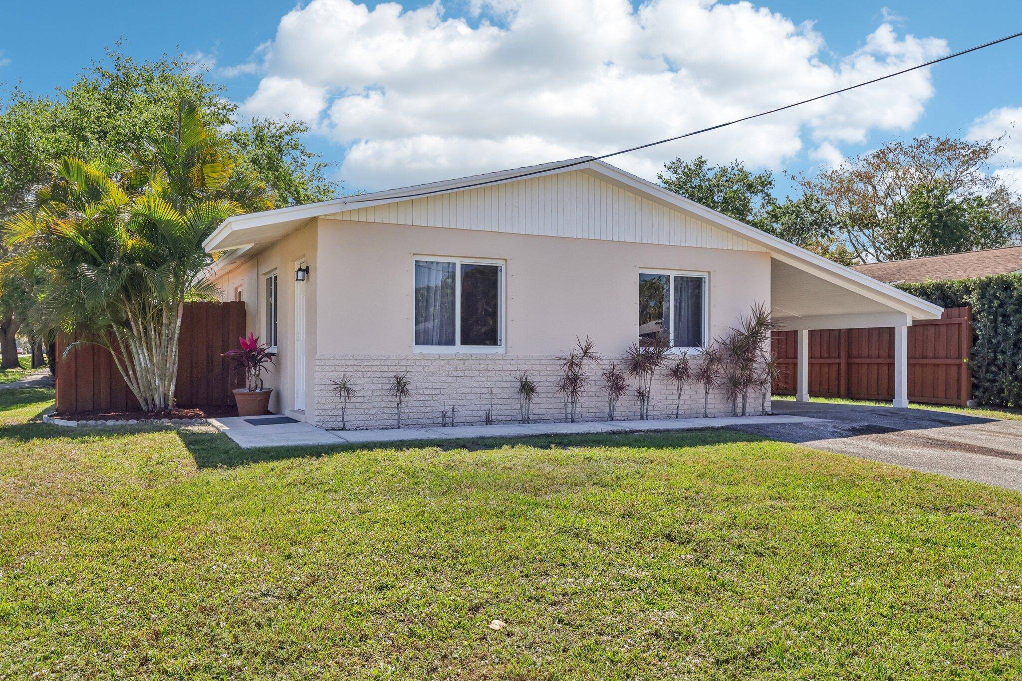 Single family home on a corner lot in the heart of Jupiter !
