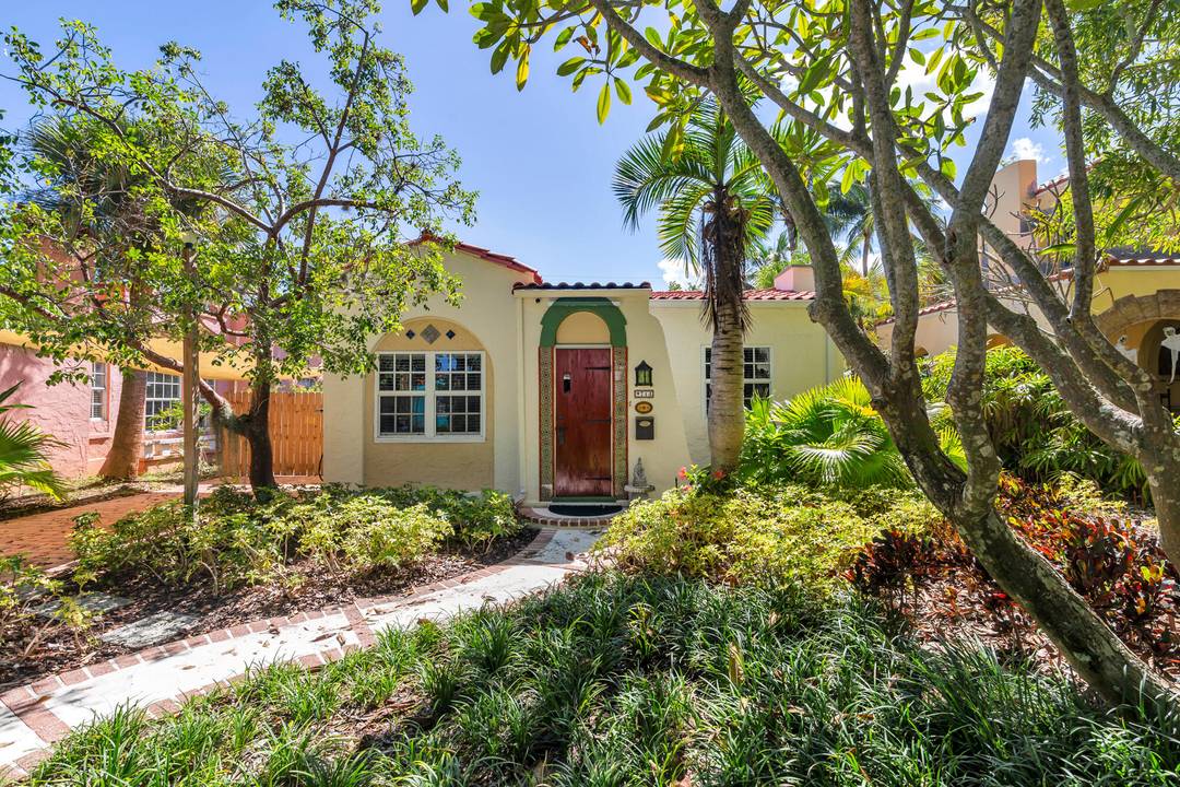 Step into a piece of history with this beautifully maintained 1920s home in West Palm Beach's desirable Flamingo Park Historic District.