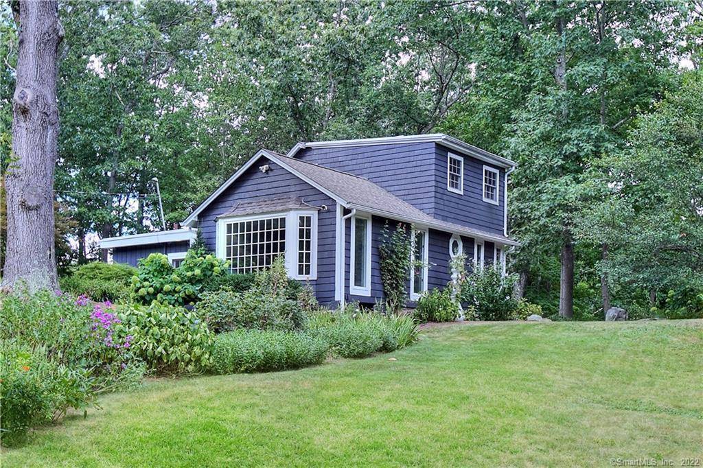 Experience the enchantment of this adorable cottage, nestled in a picturesque cul de sac.