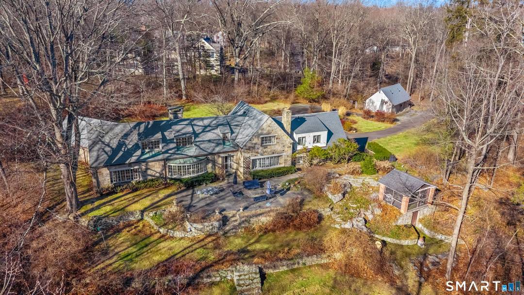 Welcome to 14 Langner Lane, a uniquely charming stone residence set on 2.