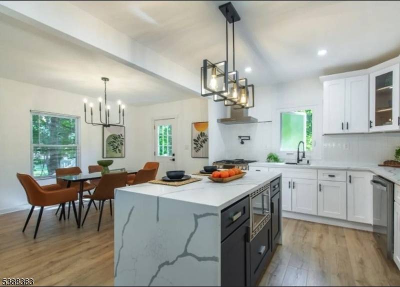 Updated, Modern with a Hint of Classic best describes this lovely 3 Bedroom, 2 Full and 1 Half Bath Side Hall Colonial, centrally located in the heart of Montclair's Thriving ...