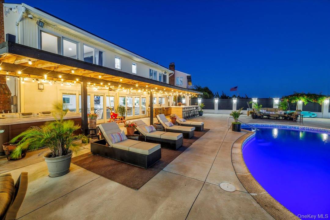 Welcome to one of Baldwin Harbor s most extraordinary waterfront properties an outdoor enthusiast s dream and a rare opportunity to own a truly one of a kind coastal retreat.