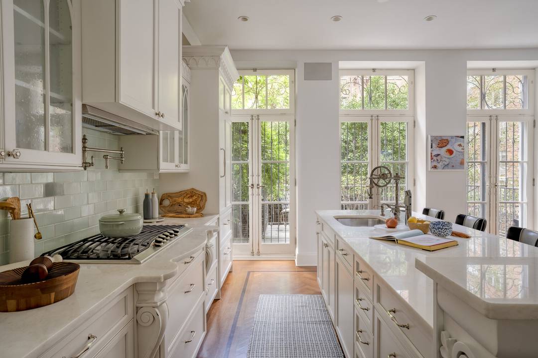 Nestled on one of Manhattans most storied and picturesque blocks, this renovated single family townhouse offers the rare combination of historic charm and modern upgrades.