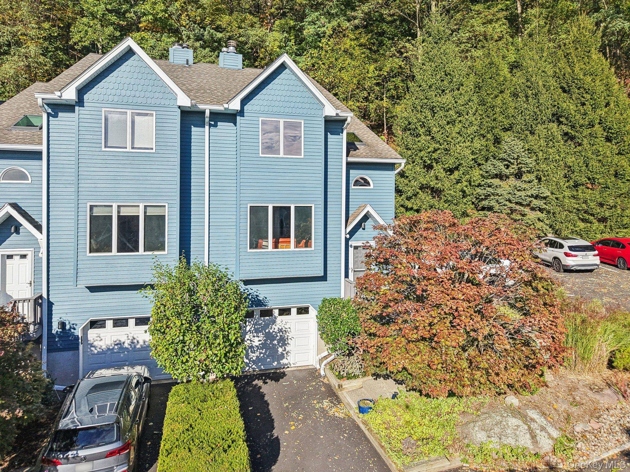 Enjoy easy living and a maintenance free lifestyle in this end unit riverview townhome in the sought after community of Village Gate.