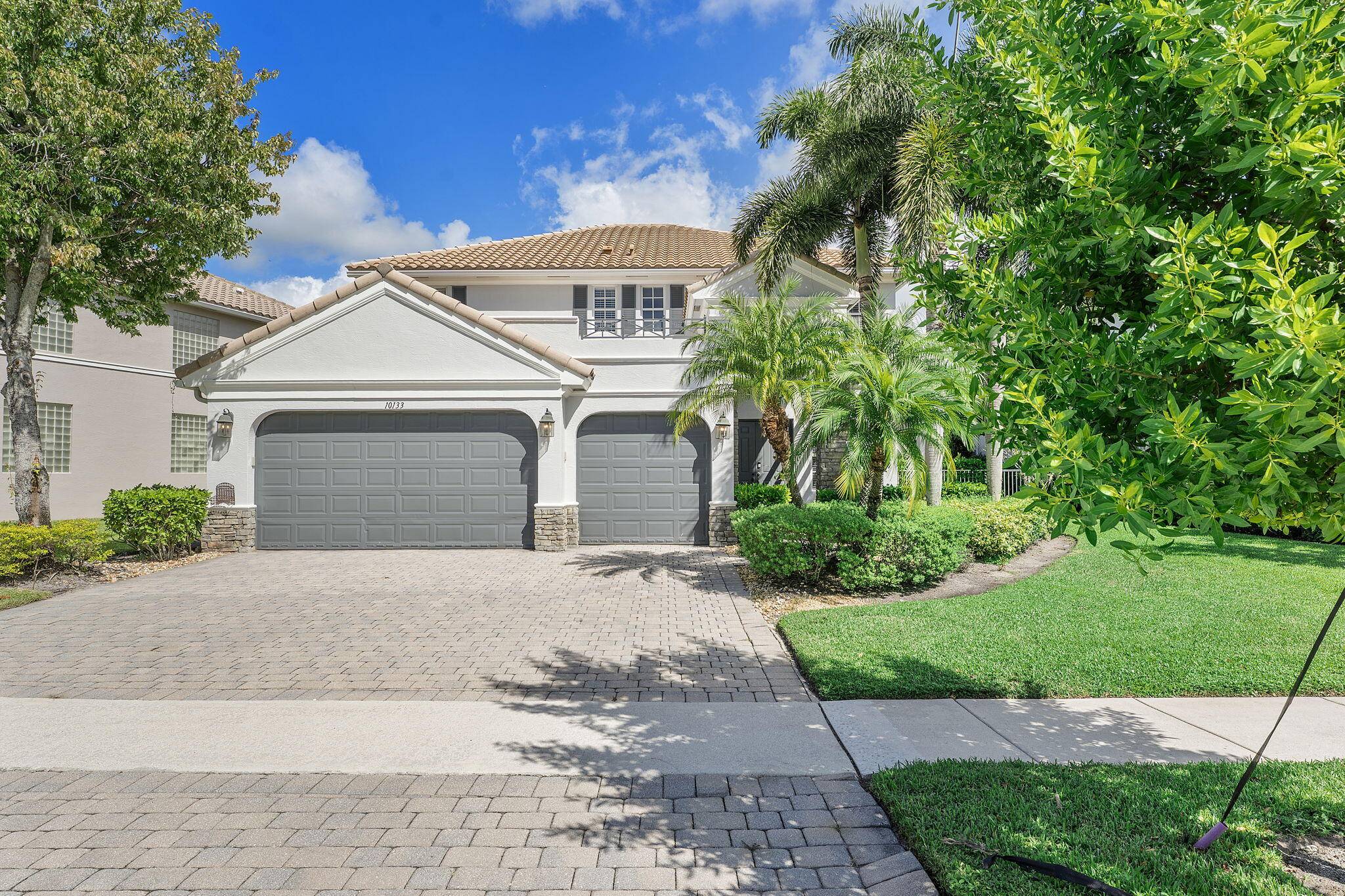 Welcome to this beautiful home featuring breathtaking lake views in a quiet, gated neighborhood.