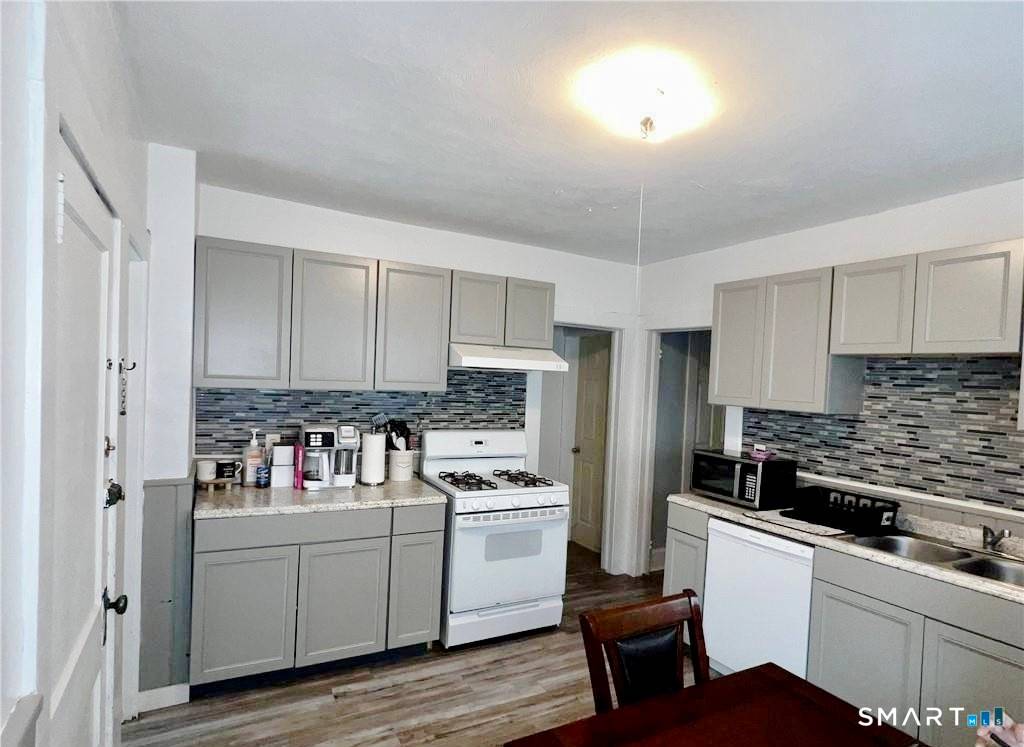 Well maintained, fully tenant occupied 3 family property featuring three spacious two bedroom, one bath units, each a little over 1, 000 square feet.