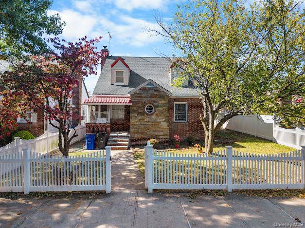 Charming Cape Cod style single family home located on a fenced corner lot in the heart of Flushing.