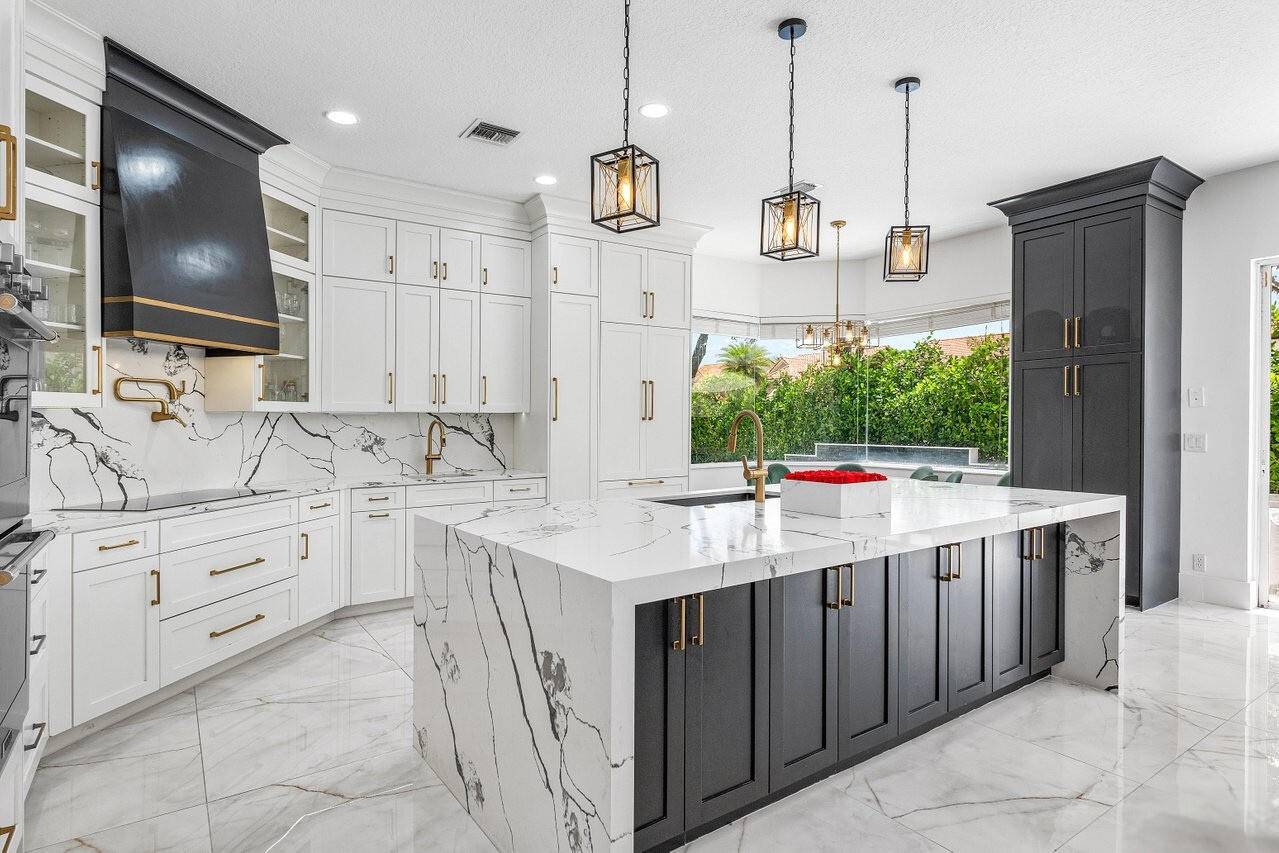 Discover this stunning two story estate in sought after Avalon Parkview Estates at Boca.