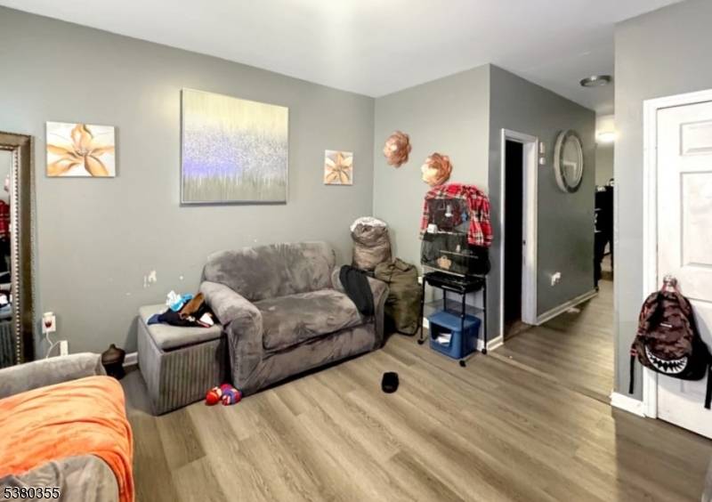 Welcome to this beautifully recently renovated three family home, situated in Paterson, NJ.