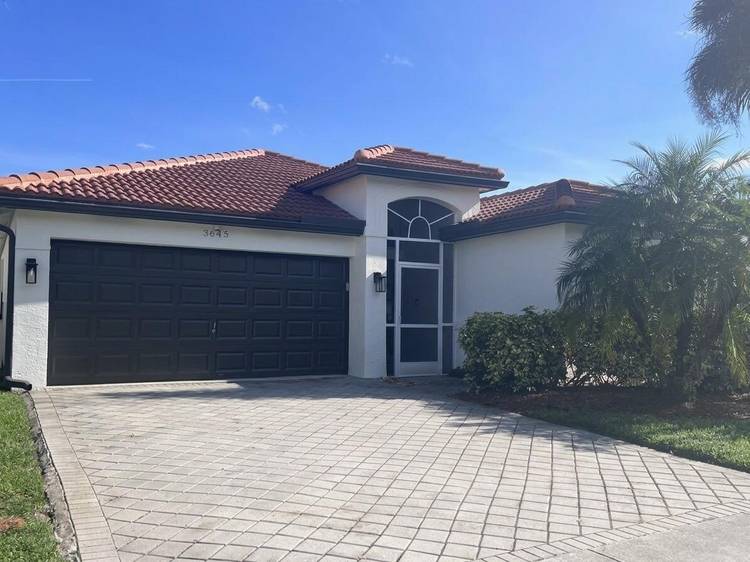 Welcome home to resort style living in the highly desirable, and gated community of Grand Isles !