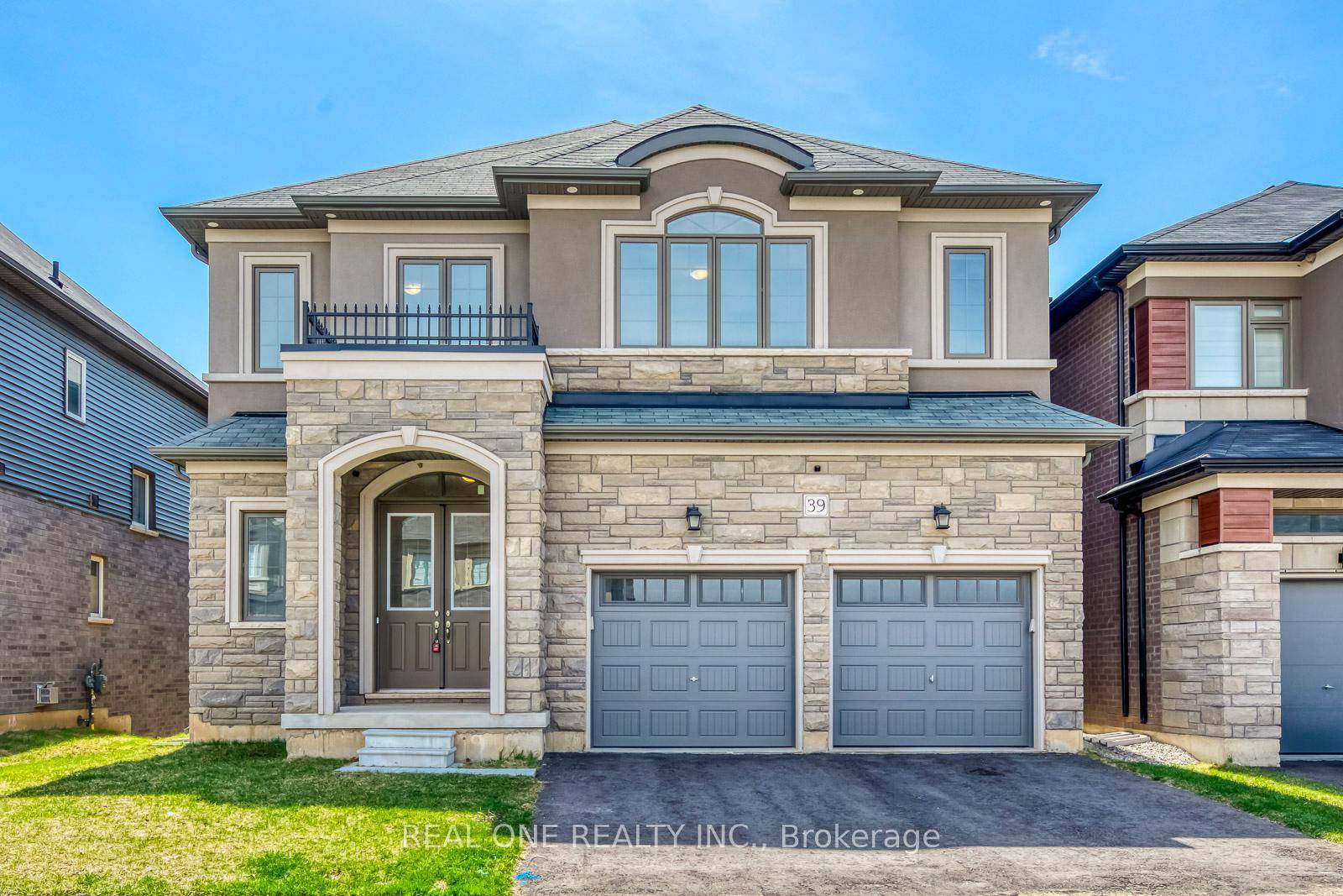 Elegant all brick 4 bedroom executive home on a premium ravine lot with walk out basement and tandem 3 car garage.
