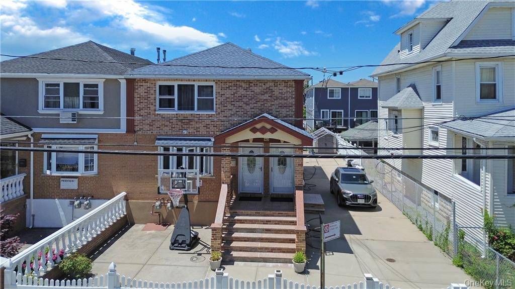 Welcome to this wonderful multi family home located in the heart of Arverne.