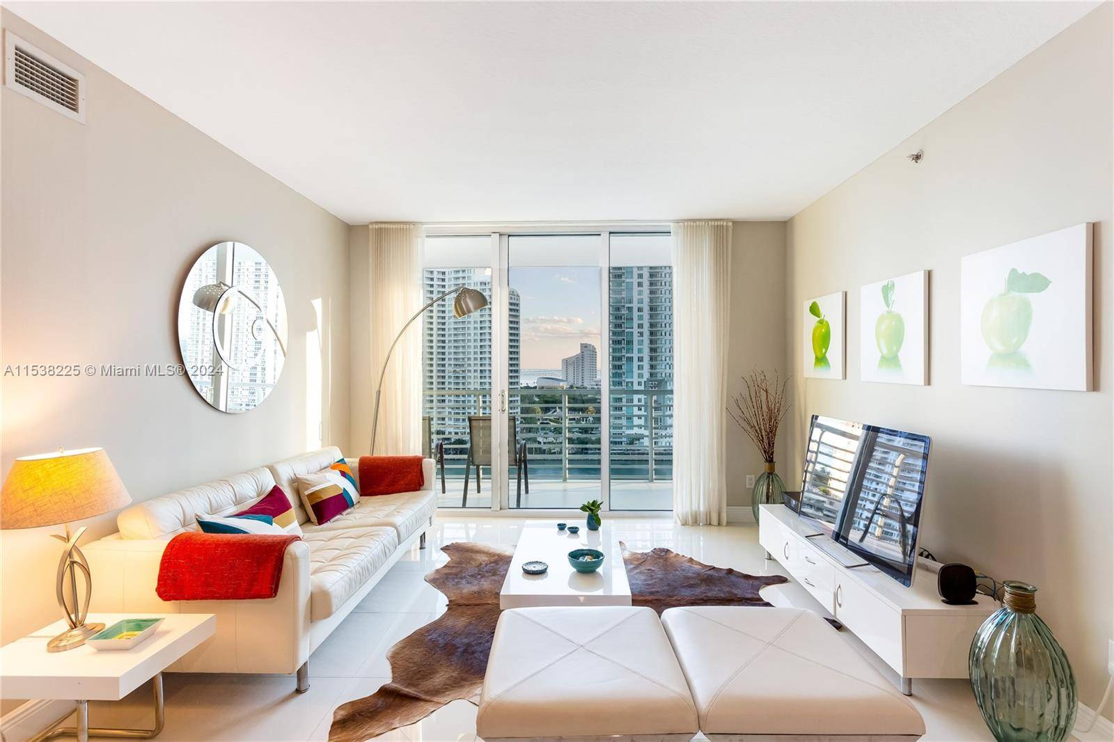 Beautiful fully furnished 2 bedrooms 2 baths condo overlooking the Miami River, Biscayne Bay, and Brickell Skyline.