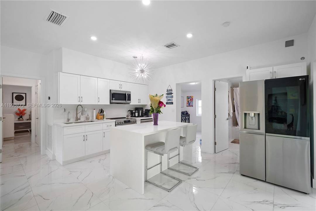 This turnkey single family home offers comfort and convenience in a desirable East Hallandale neighborhood.