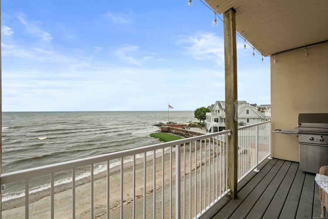 Experience the ultimate in coastal living w this stunning direct waterfront condominium, offering breathtaking views of Long Island Sound your very own private sandy beach.