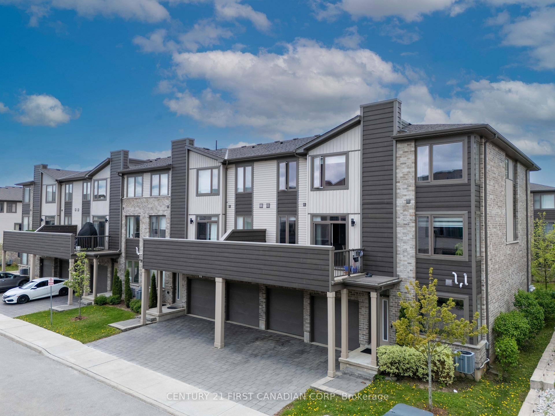 RARE CORNER UNIT Modern Townhome in Summerside Double Garage Premium Features.