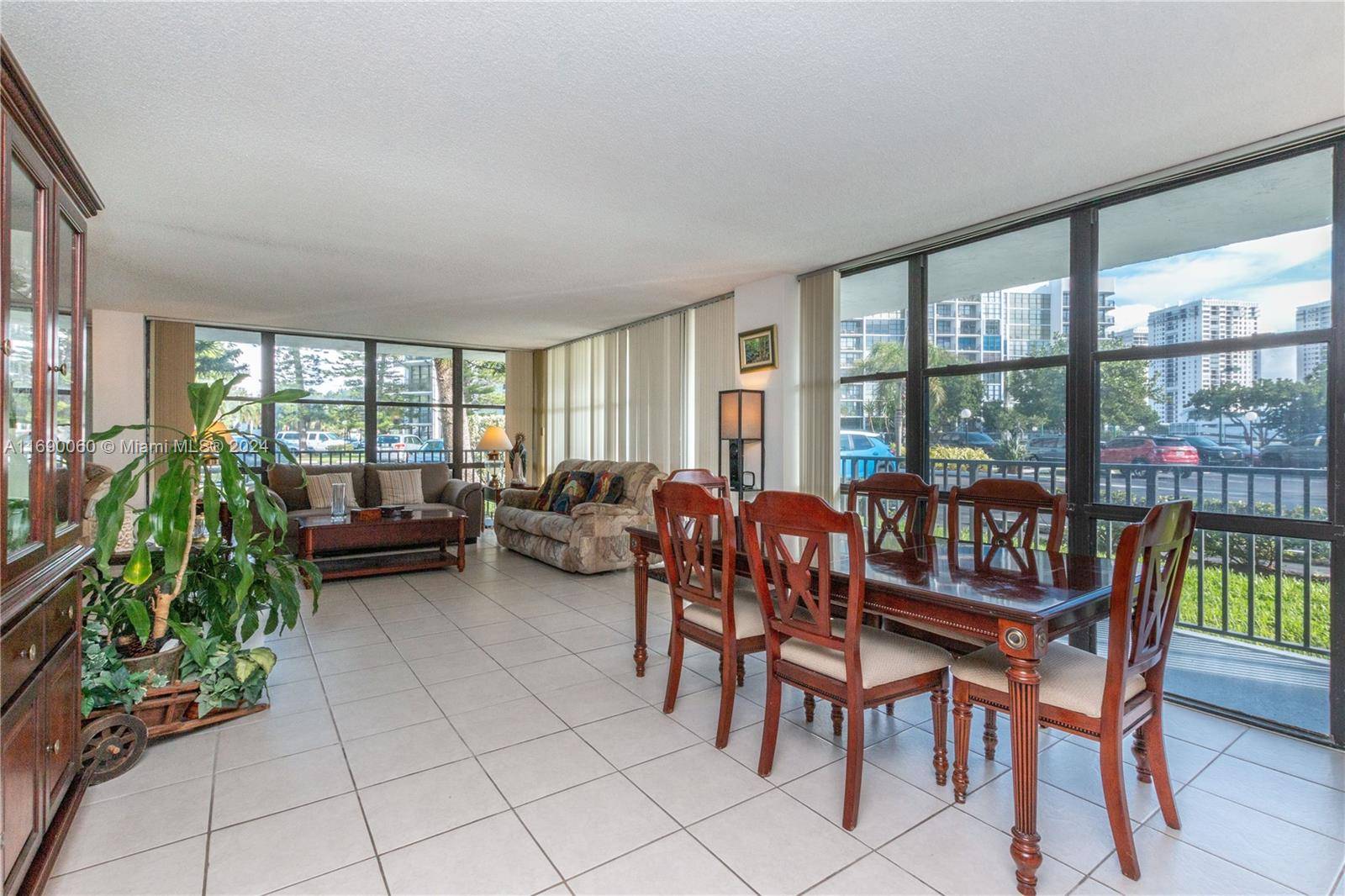 Bright and airy corner unit on the first floor with a wrap around porch !