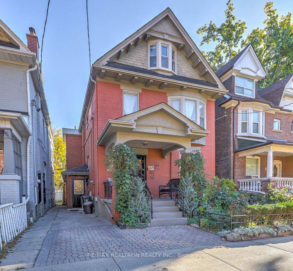 RARE FIND ! ! ! A Detached 5 2 Bedroom Home on an Extra Wide lot with a Private Driveway at the front of the Home and an Oversized Detached ...
