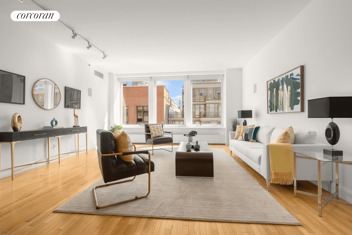 Welcome to 121 West 19th Street, 9E, a sun drenched, 1529 sq ft 1 bedroom 1 interior bedroom den home office and 2 full bathroom condo with open south facing ...