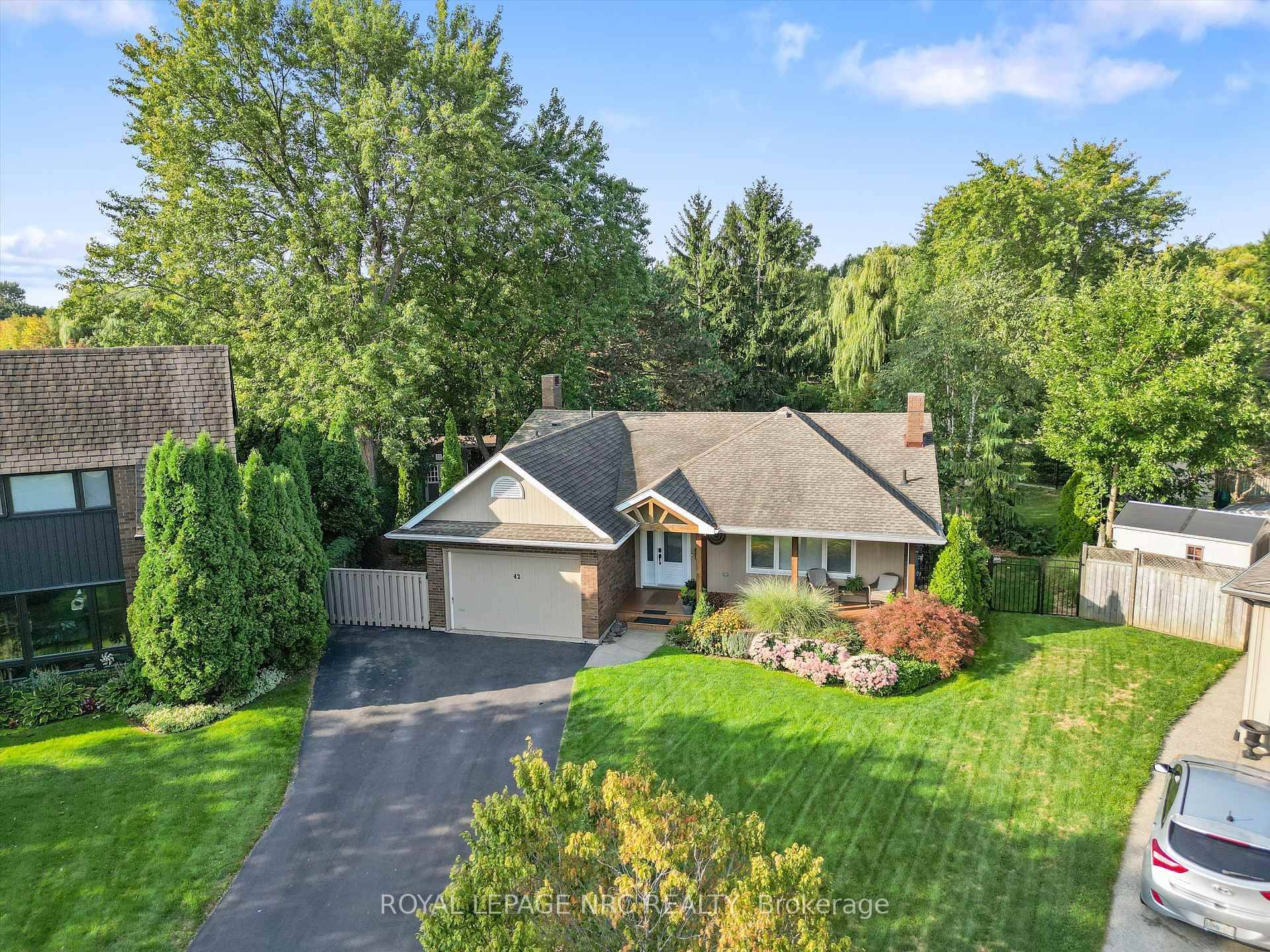 Nestled at the quiet end of a cul de sac, 42 The Cedars offers an incredibly rare combination of privacy, nature, and beautifully reimagined living space.