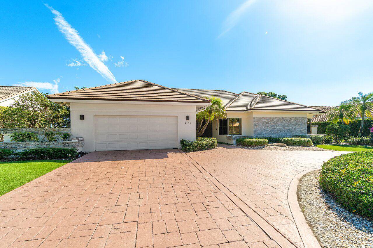 Welcome to 4237 Bocaire Boulevard, a stunning retreat where luxury and tranquility intertwine.