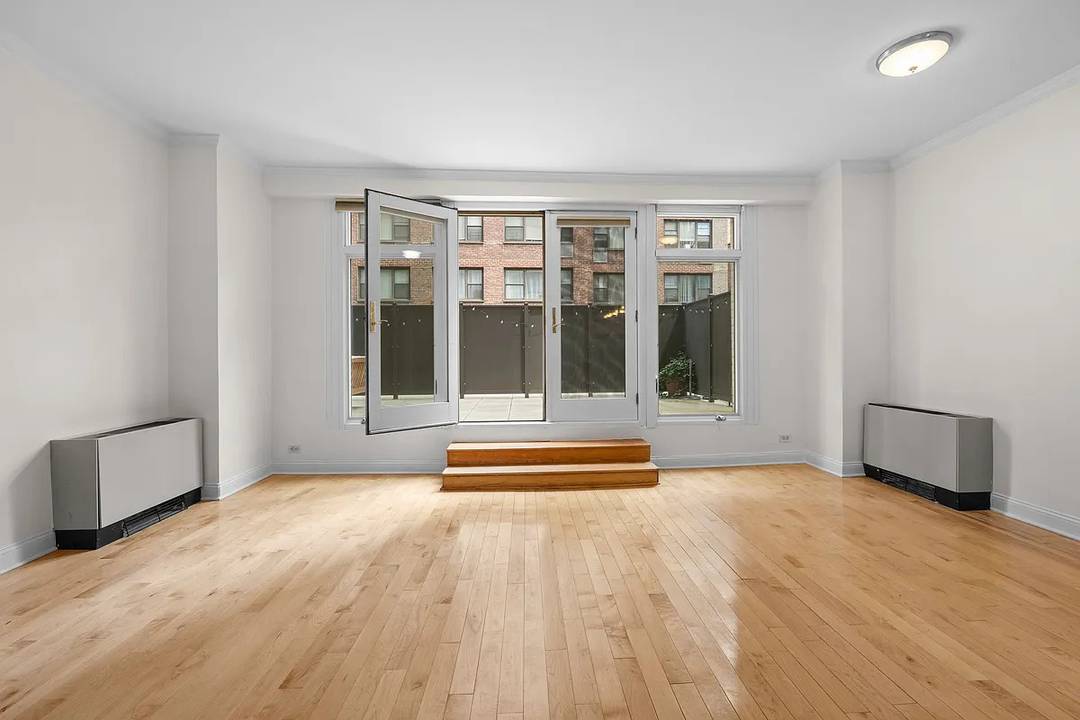 Private Garden Living with Two Bedroom Flexibility I am excited to introduce you to 345 East 73rd Street 1A, a rare Upper East Side residence that offers not only an ...