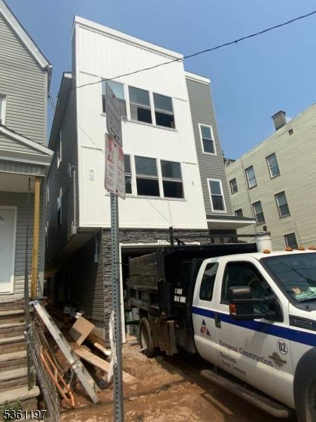 Brand new 2 fam home to be build according to plans 1st fl garage, utility room, rec room, with half bath connection to apartment 1 with 3 bedrooms living dining ...