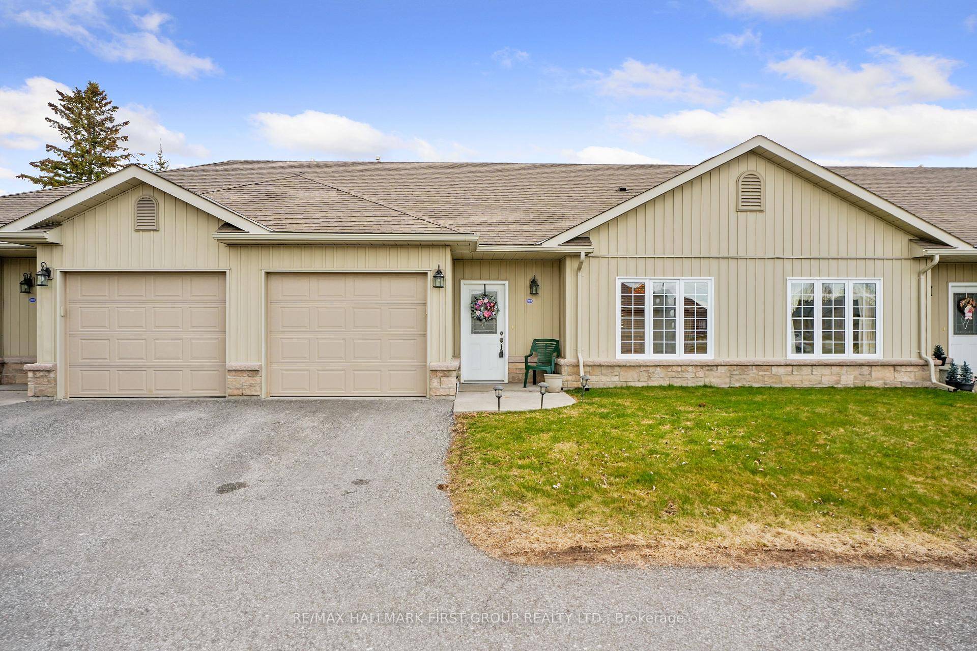 Enjoy low maintenance living in this thoughtfully designed one level townhouse.