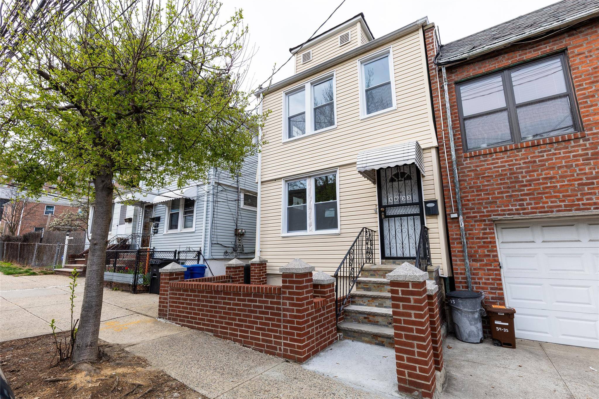 Welcome to this charming and fully updated two family home in the heart of Woodside !