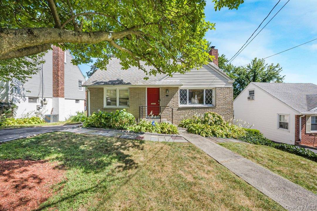 Welcome to this sun drenched 4 bedroom, 1.