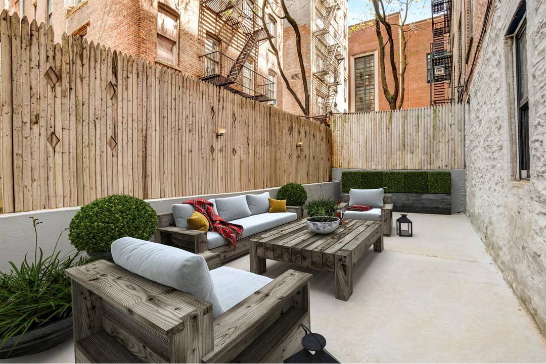 This special 2 bedroom residence with huge private outdoor space and in unit laundry on the Upper West Side is an absolute must see !