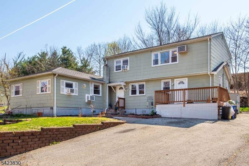 Discover a unique and versatile home in the desirable Pinecliff Lake community of West Milford !