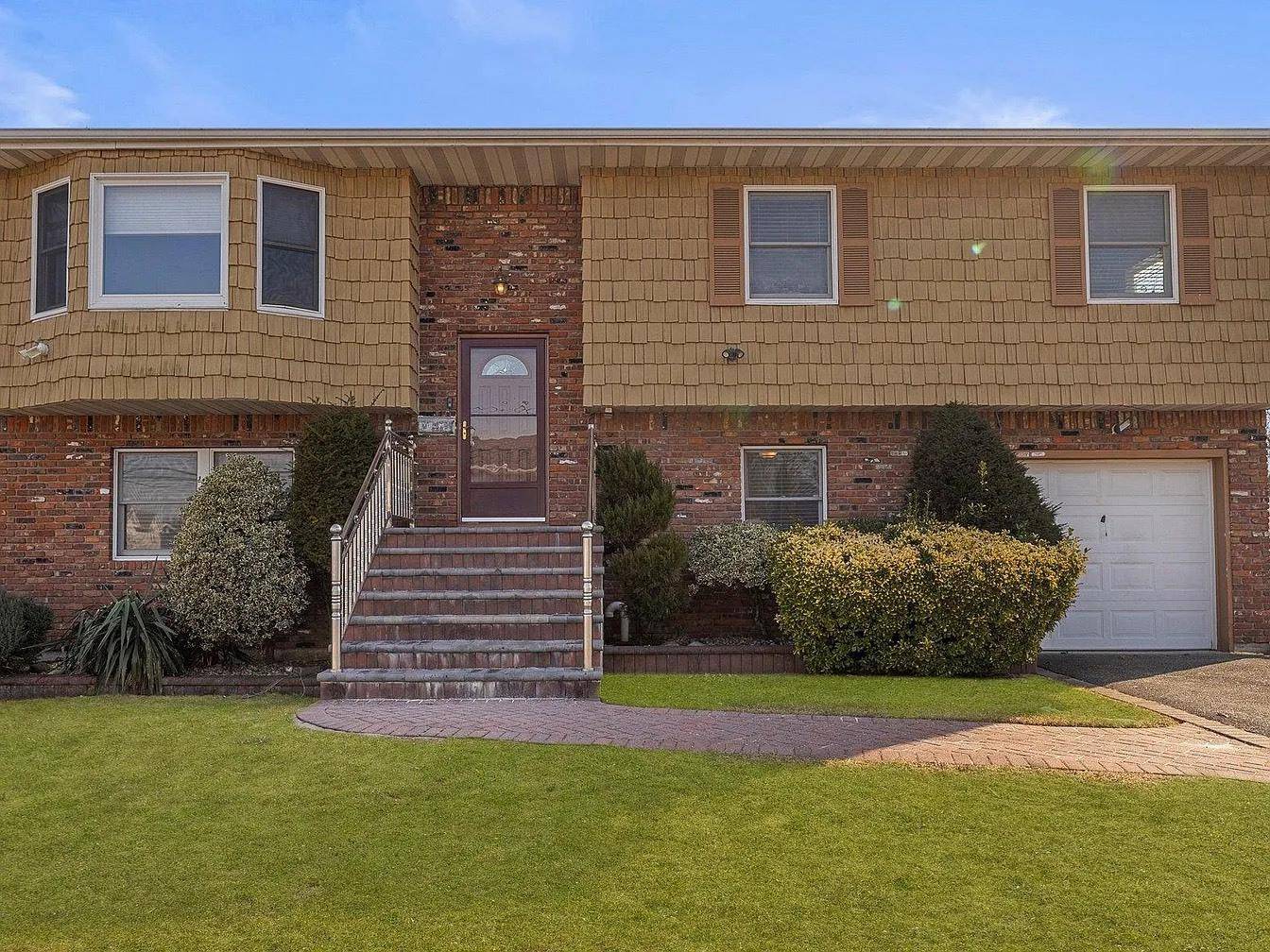 Spacious second floor apartment in North Babylon featuring 3 bedrooms and 2 full bathrooms.