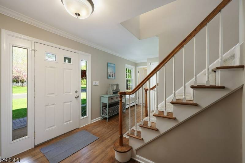 Tucked on a quiet cul de sac in Basking Ridge, this beautifully designed colonial blends open concept living with exceptional outdoor space.