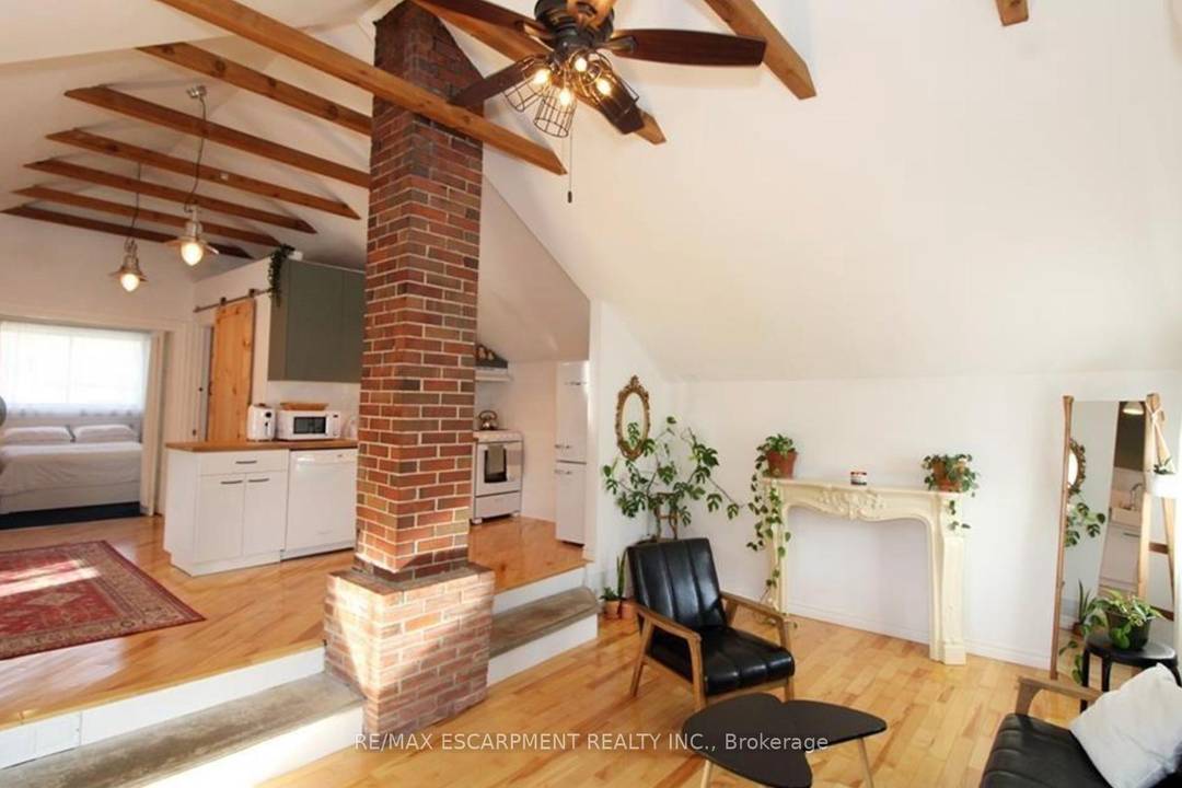 A standout one bedroom perfect for a couple or single professional, this upper unit delivers authentic loft living with a big city vibe.