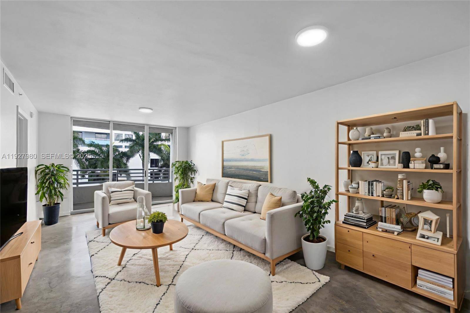 Welcome to this light filled 2BD 2BA residence in the heart of Miami Beach, offering tranquil bay views and effortless indoor outdoor living.