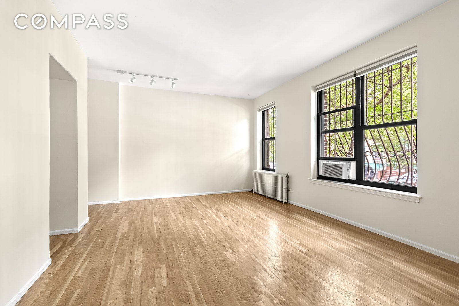 Welcome to Unit 1F at 338 Prospect Place a smartly designed studio condo that combines comfort, functionality, and a prime Brooklyn location.