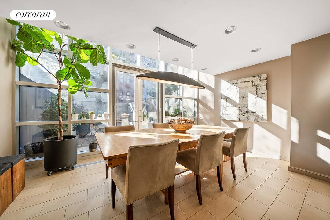 A gracious townhouse on a beautifully maintained, tree lined block defined by architectural integrity and a strong sense of community.