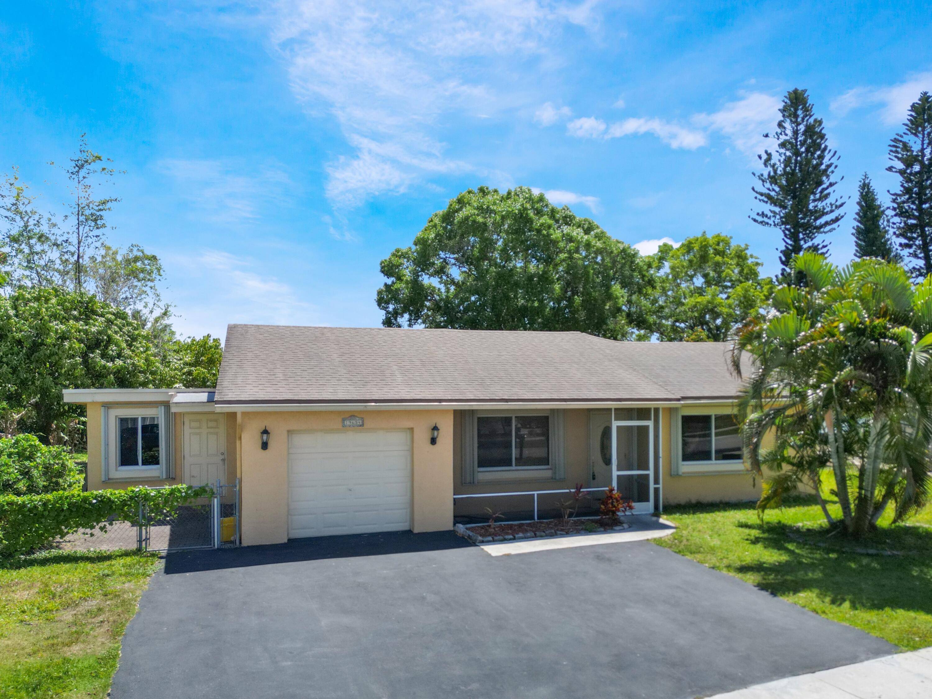 Handyman special with 5 bedrooms, 3 full baths, and no carpet, brimming with potential and offering a rare opportunity to create your dream home in an exceptional West Boca Raton ...