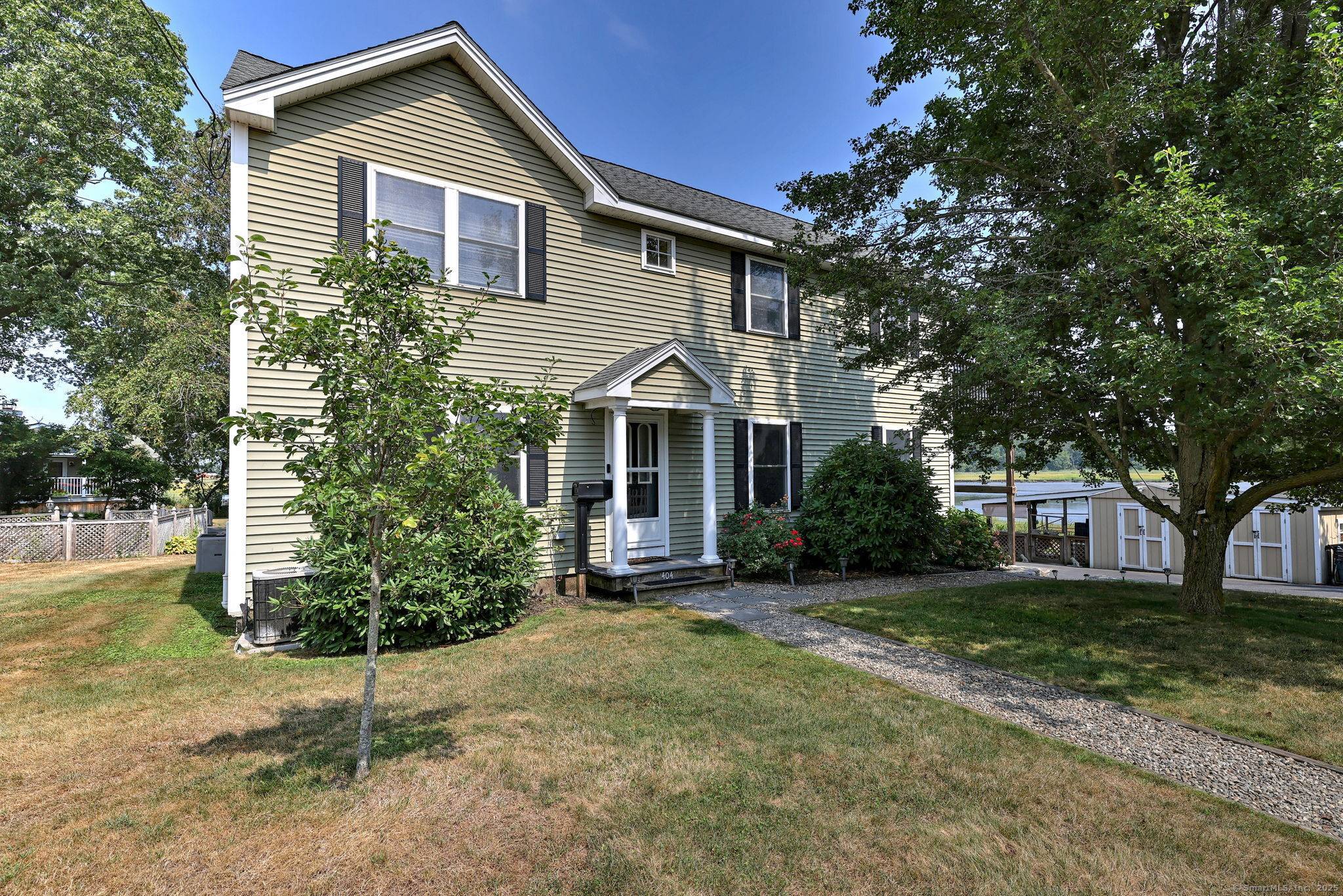 Welcome to Waterfront Living a stunning 5 bedroom Colonial.