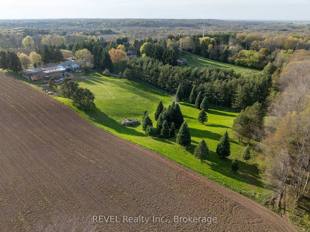 Welcome to 2010 Hansler Street a truly distinctive estate offering an exceptional blend of space, privacy, and versatility.