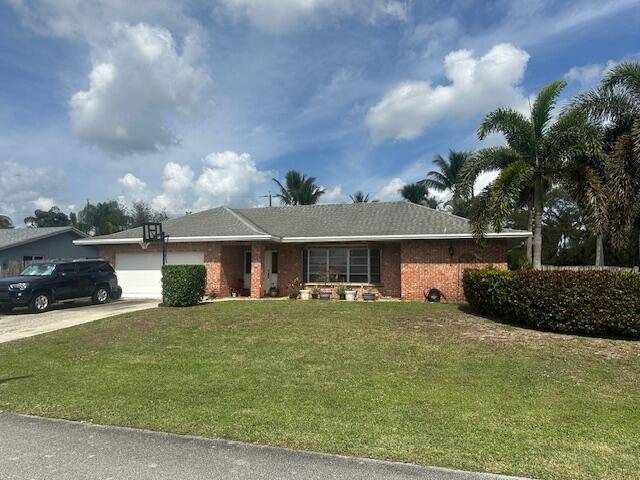 Located in the highly sought after area of Palm Beach Gardens, this 3 bedroom, 2 athroom home sits on an oversized corner lot, close to shopping, schools, hospitals, and local ...