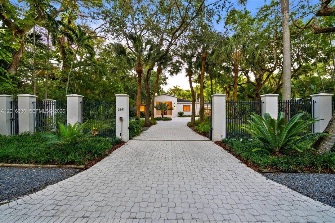 Exceptional half acre estate in one of Coconut Grove s most coveted blocks.