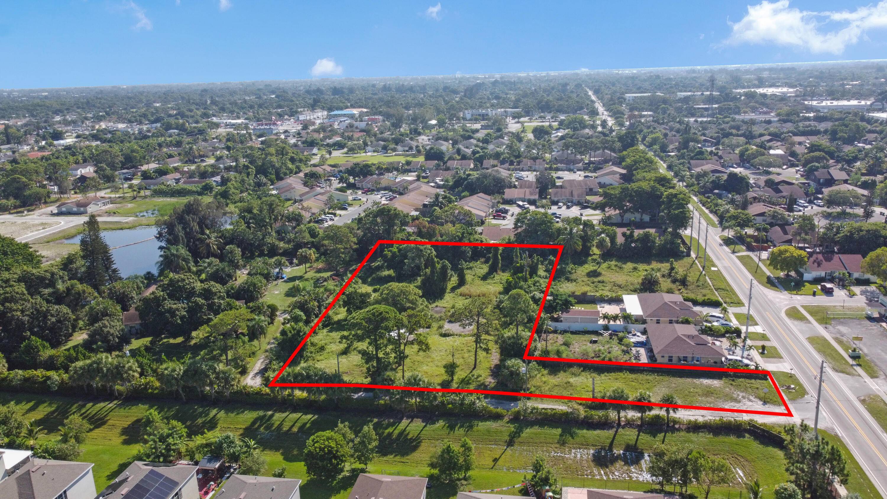 This prime 1. 41 acre property in central Lake Worth offers two parcels zoned MR 5, ideal for multi family development.