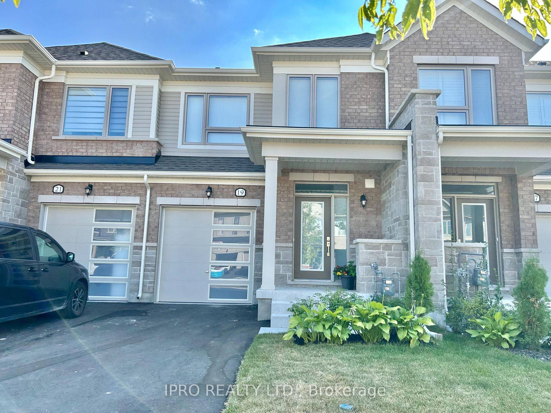 Welcome to this Modern Brick and Stone Elevation B Premium townhouse in Fergus's new Storybrook subdivision.