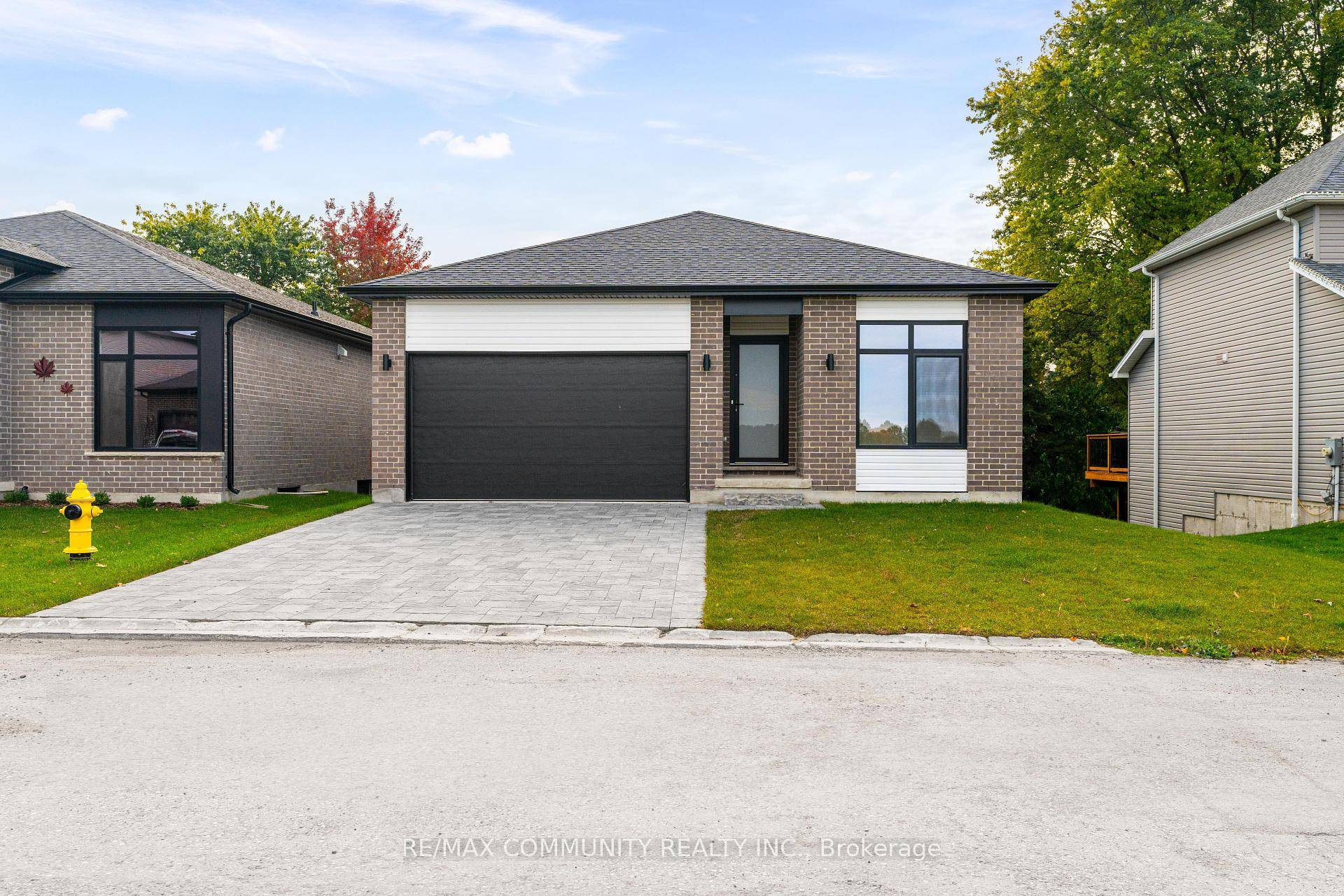 Experience The Perfect Blend Of Comfort And Sophistication In This Beautifully Designed Detached Bungalow Located In Desirable Strathroy.