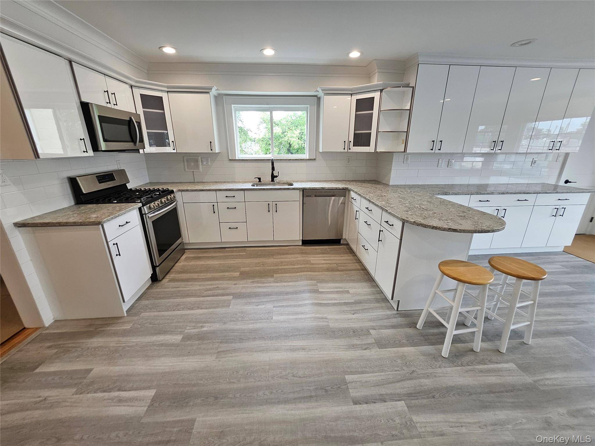 Welcome to this beautifully updated and sun filled 2 bedroom, 2 bath apartment located on the 2nd FL of a well maintained building.