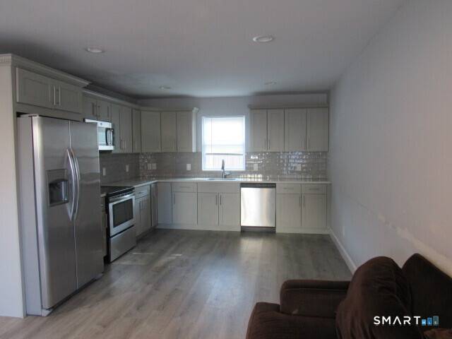 Spectacular 4 bedroom townhouse offering space, comfort, and modern updates throughout.